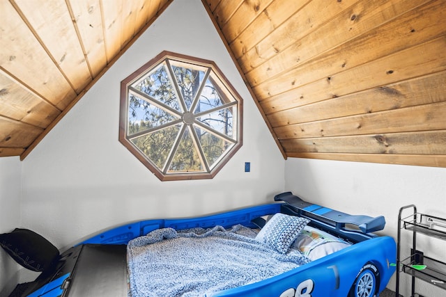 bedroom with wooden ceiling and vaulted ceiling