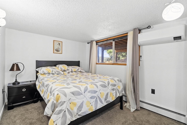 carpeted bedroom featuring a wall unit AC, a textured ceiling, and baseboard heating