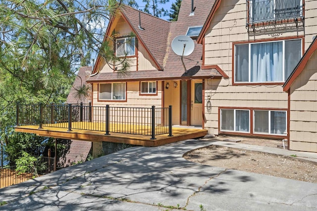 exterior space featuring a wooden deck