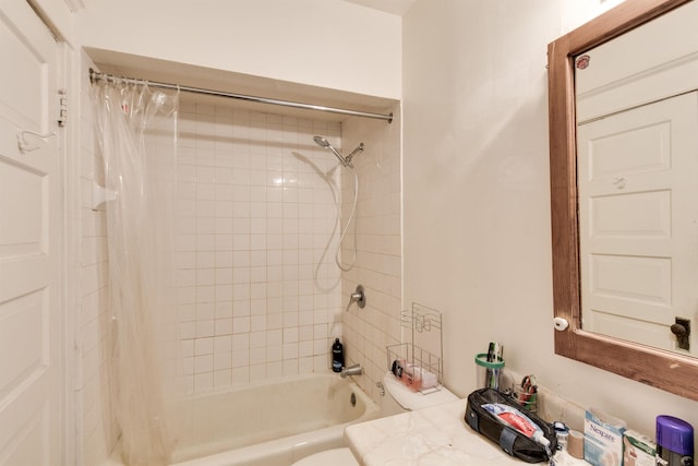 bathroom with shower / bath combination with curtain