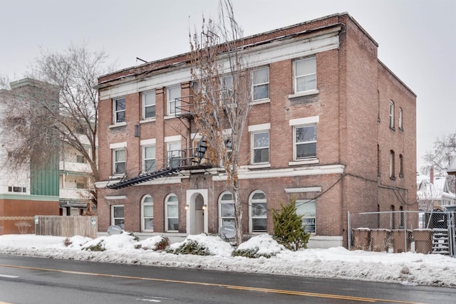 view of snow covered property