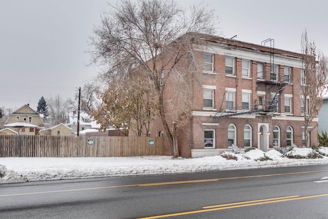 view of snow covered property