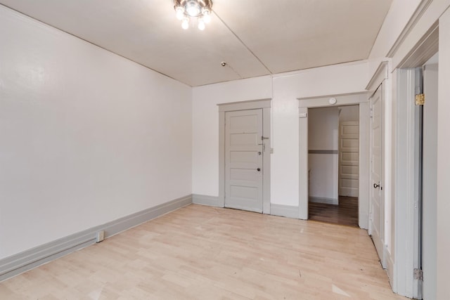 empty room with light wood-type flooring