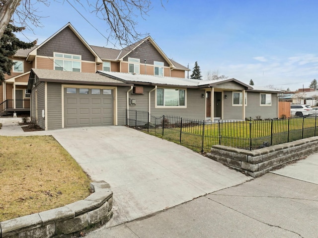 view of front of house with a garage and a front lawn