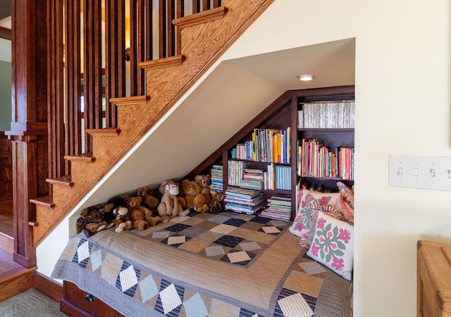 interior space with carpet flooring and lofted ceiling