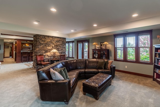 carpeted living room featuring a wealth of natural light