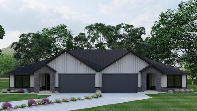 view of front of property featuring a garage and a front lawn