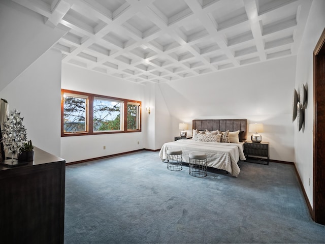 carpeted bedroom with beamed ceiling and coffered ceiling