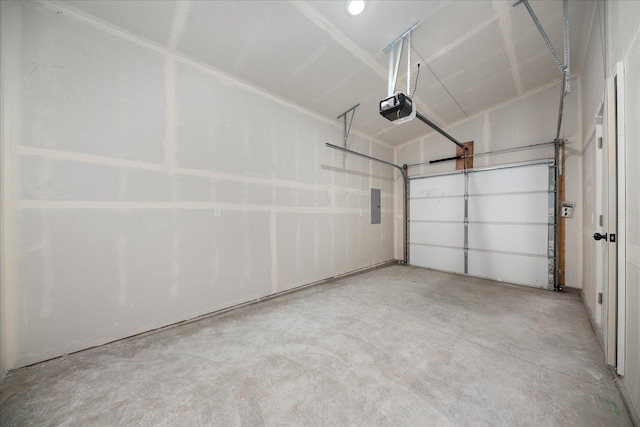 garage featuring electric panel and a garage door opener