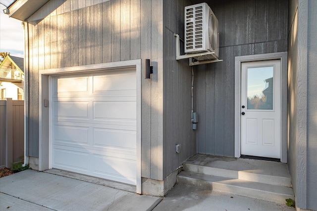 view of exterior entry featuring a garage