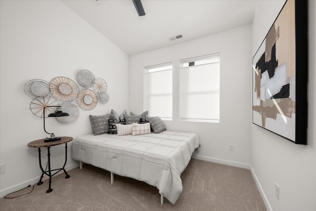 bedroom featuring light carpet, ceiling fan, and lofted ceiling