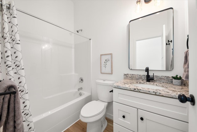 full bathroom featuring wood-type flooring, vanity, toilet, and shower / bathtub combination with curtain