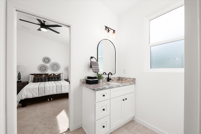 bathroom with vanity and ceiling fan