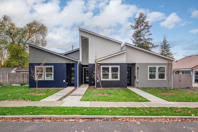 view of front of home with a front yard