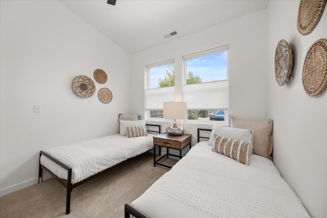 bedroom featuring carpet, ceiling fan, and lofted ceiling