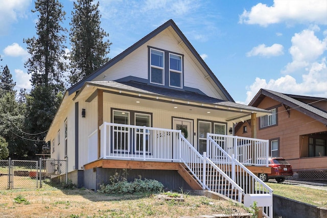 view of front of property featuring covered porch