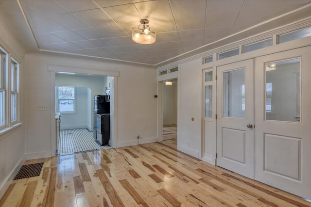 entrance foyer with light wood-type flooring