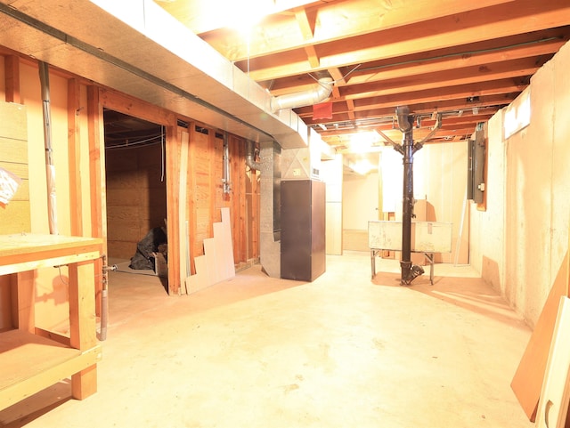 basement featuring heating unit