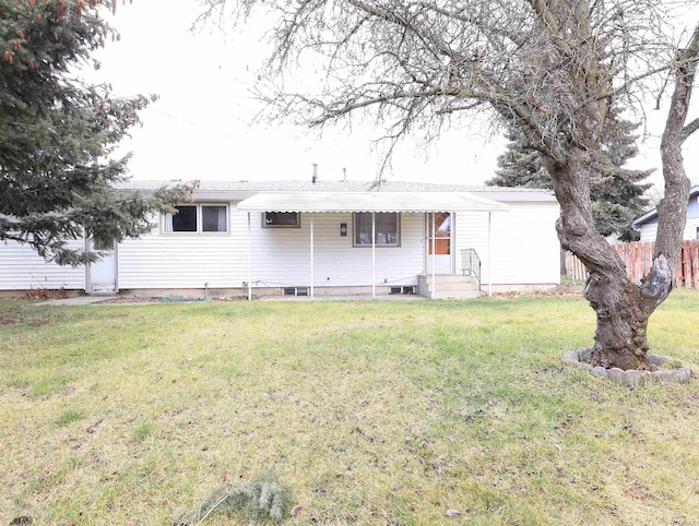 view of front of home with a front lawn