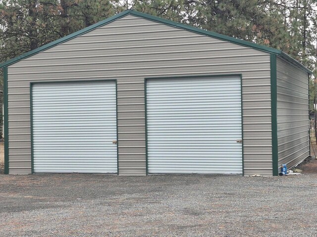 view of outbuilding featuring a carport