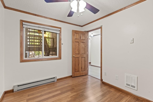 empty room featuring a baseboard heating unit, a textured ceiling, ceiling fan, and light hardwood / wood-style floors