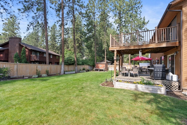 view of yard with a patio and a deck