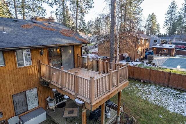 wooden deck featuring a water view