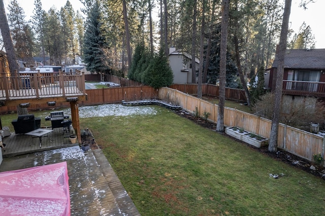 view of yard featuring a deck