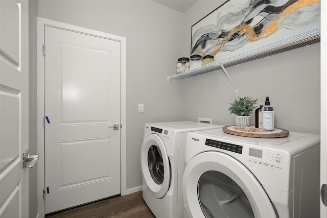 laundry room featuring dark wood-type flooring and independent washer and dryer