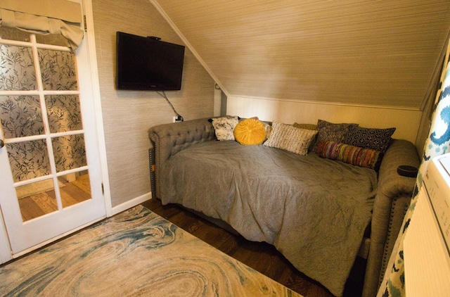 bedroom featuring lofted ceiling, wood ceiling, and dark hardwood / wood-style floors