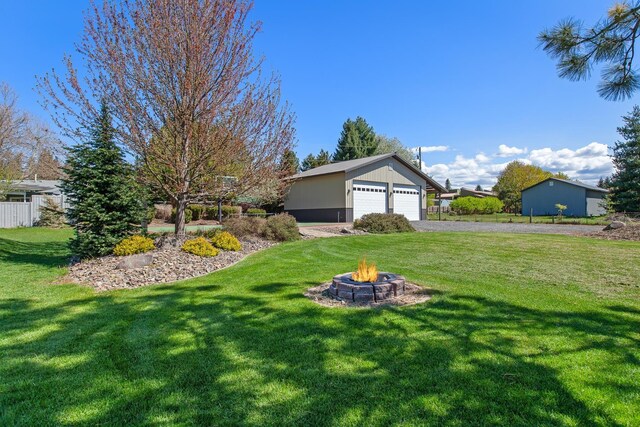 view of yard featuring a fire pit