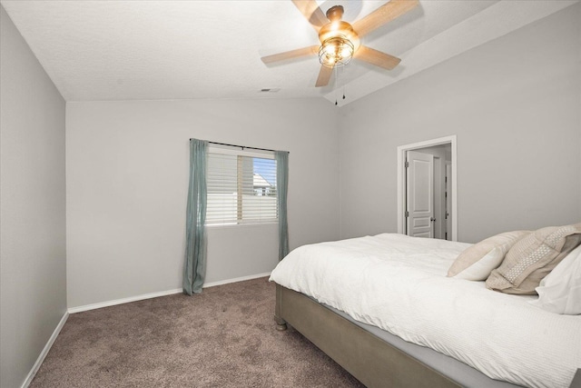 carpeted bedroom with lofted ceiling and ceiling fan