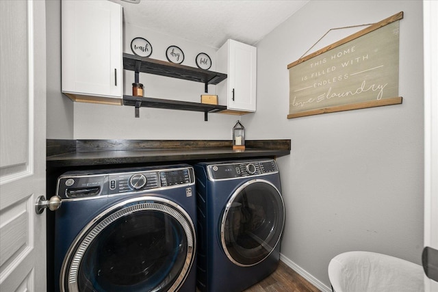 laundry room with independent washer and dryer, cabinets, and dark hardwood / wood-style floors