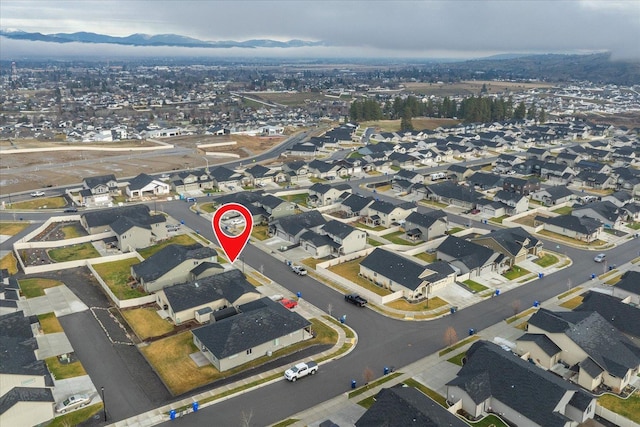 drone / aerial view featuring a mountain view