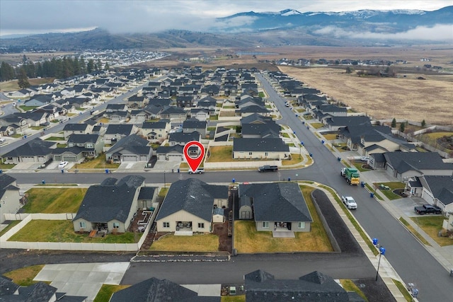 bird's eye view with a mountain view