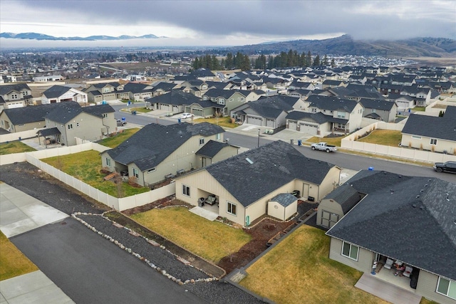 drone / aerial view featuring a mountain view