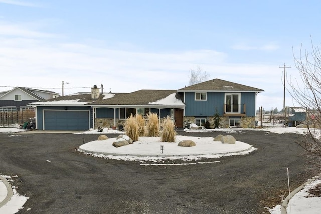 split level home featuring a garage