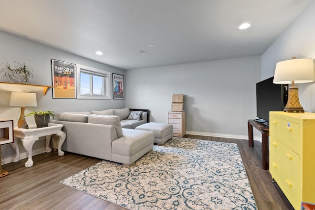 living room with dark wood-type flooring