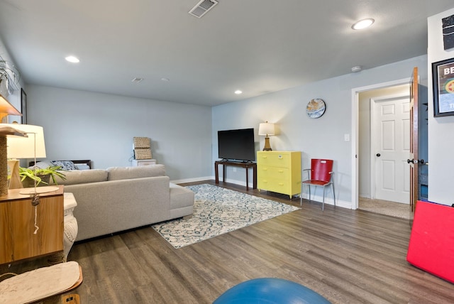 living room with dark hardwood / wood-style floors