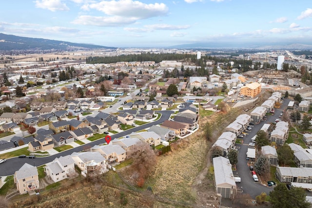 drone / aerial view featuring a mountain view