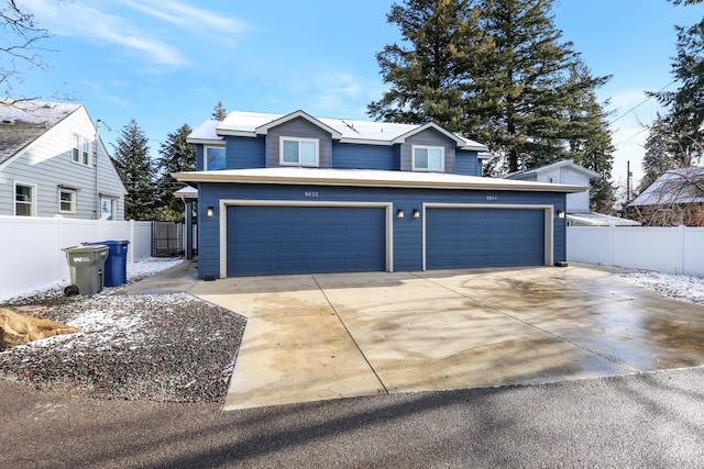 view of front property with a garage