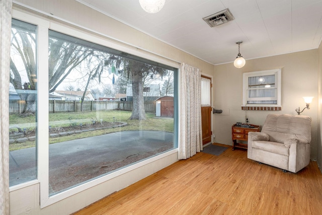 unfurnished room with wood-type flooring