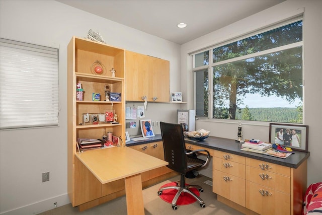 office space featuring built in desk