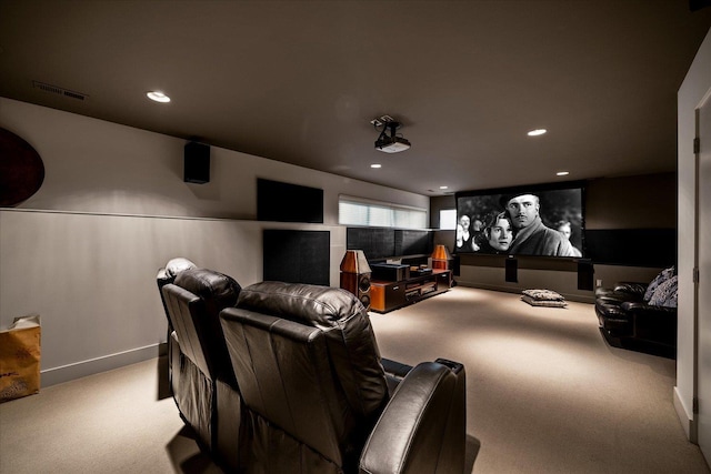 home theater with light carpet