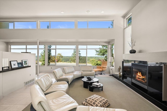 living room with light tile patterned floors