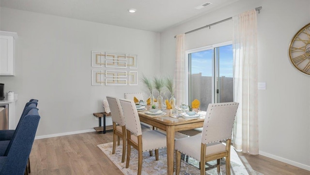 dining area featuring light hardwood / wood-style floors