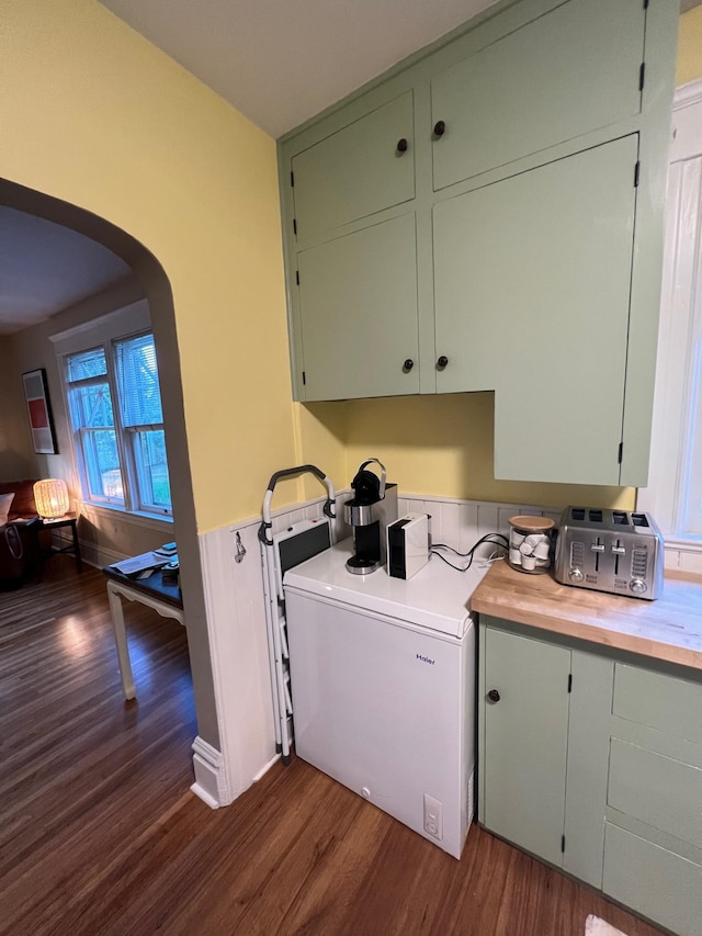 kitchen with wood counters and dark hardwood / wood-style floors