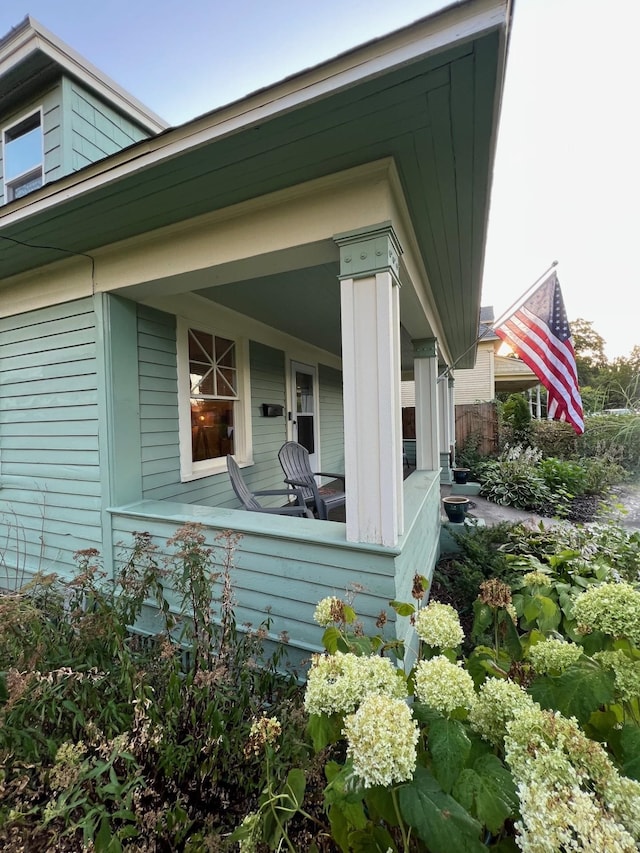 view of home's exterior with a porch