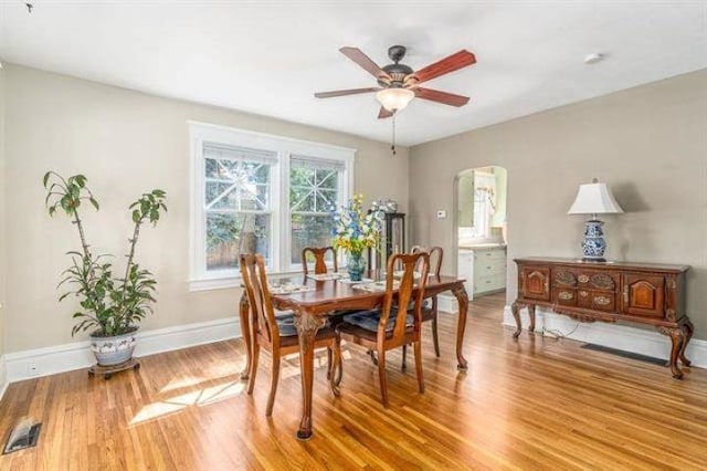 dining area featuring ceiling fan and light hardwood / wood-style floors