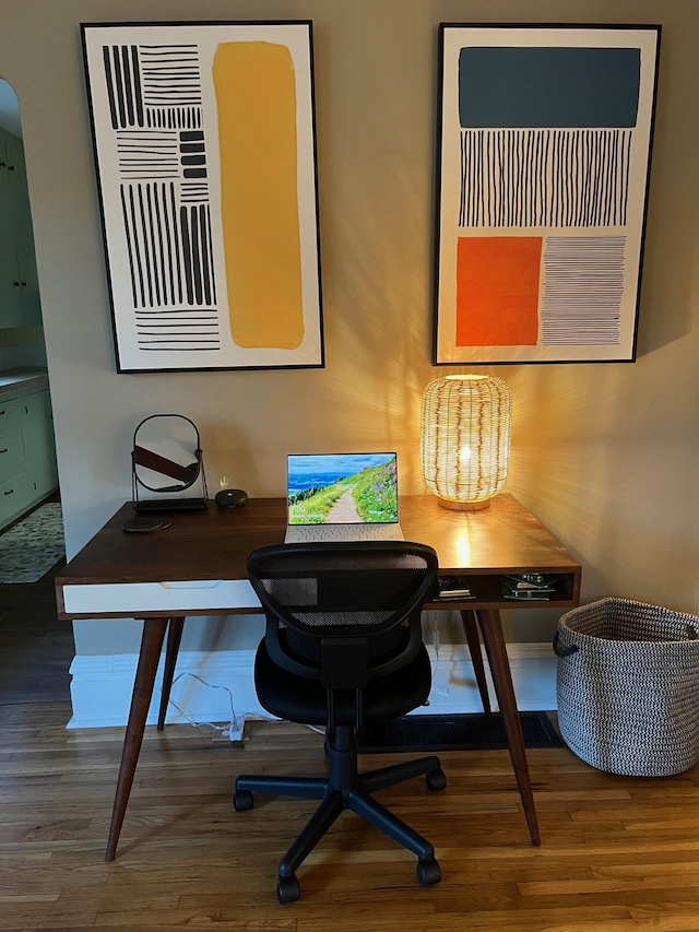 office space with hardwood / wood-style flooring